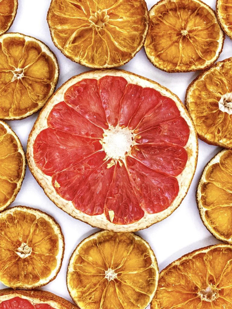 How to Dry Citrus Slices for your Holiday Cocktails and Crafts featured by top NC food blogger, Food Diary of a City Girl